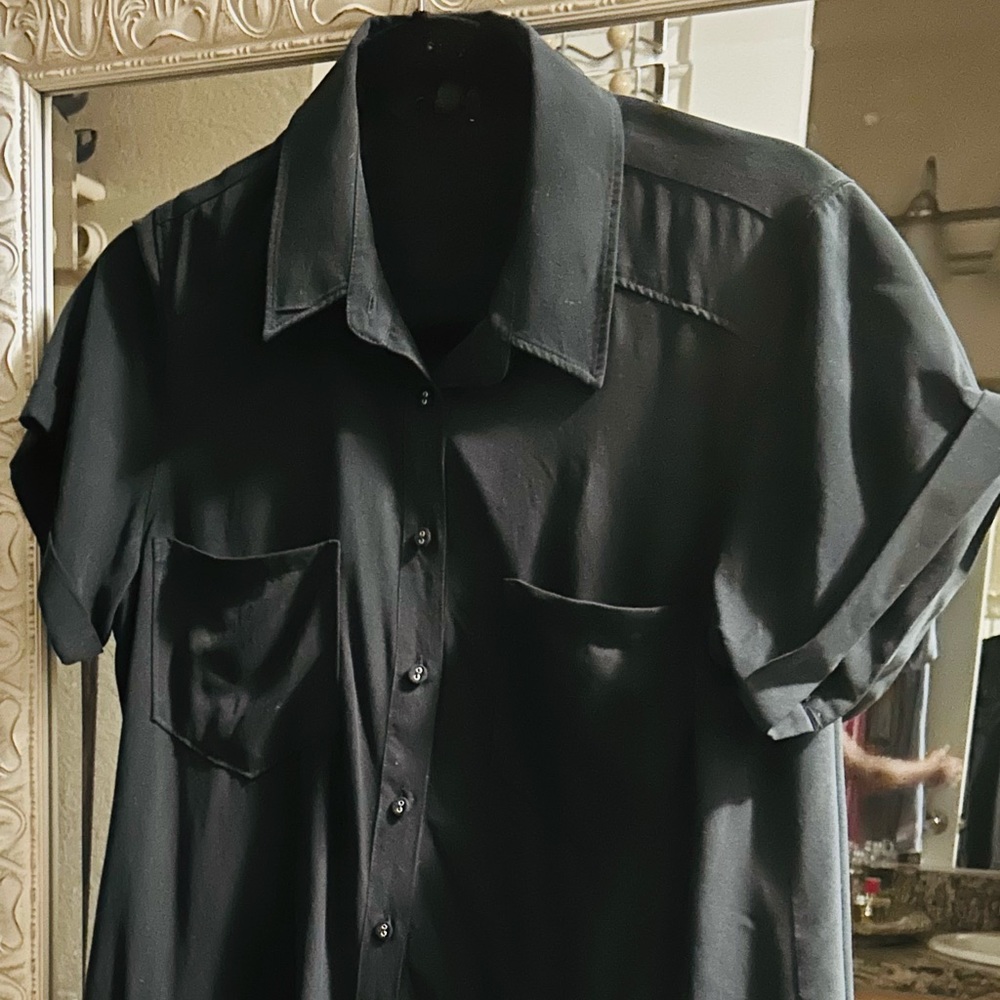 Paige casual black dress. Great condition. Cute ruffle on the bottom.